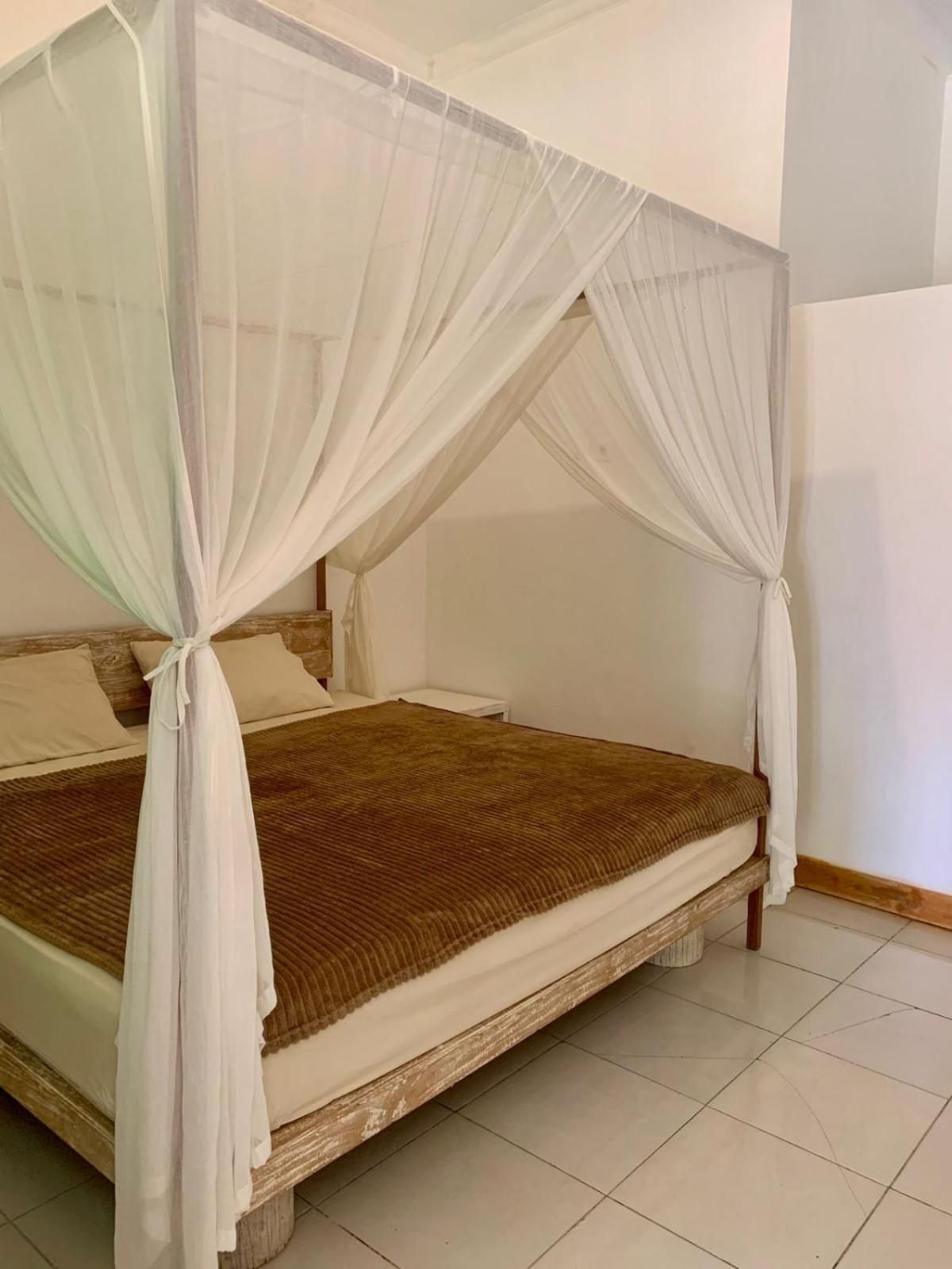 The Village Rua Beach Homestay Екстериор снимка