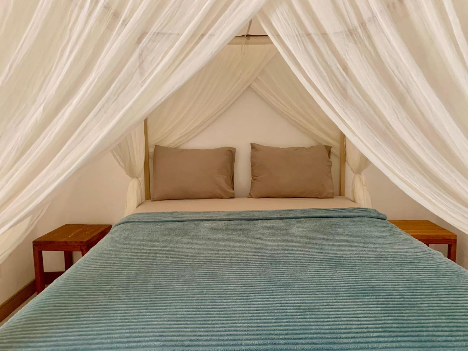 The Village Rua Beach Homestay Екстериор снимка