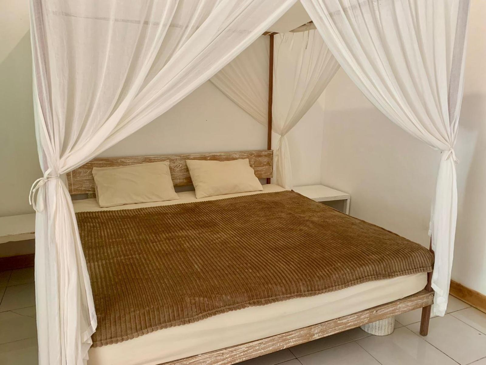The Village Rua Beach Homestay Екстериор снимка