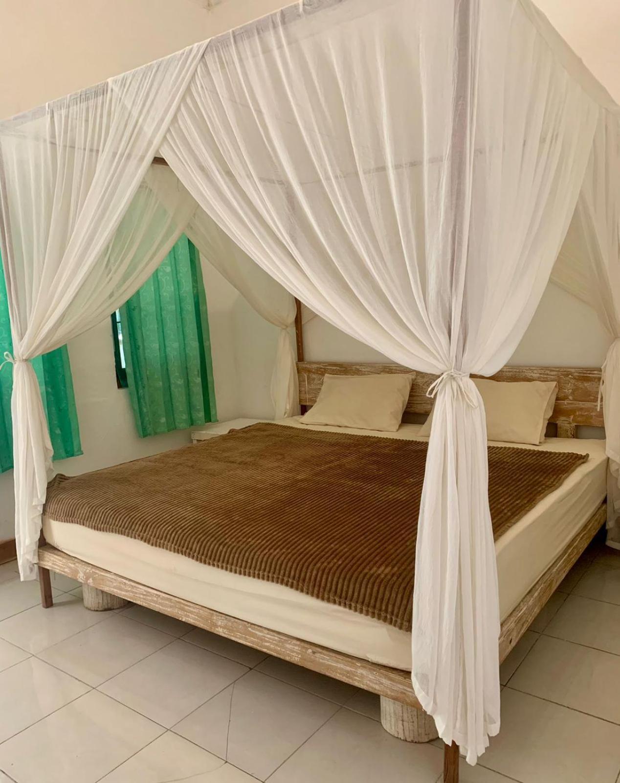 The Village Rua Beach Homestay Екстериор снимка